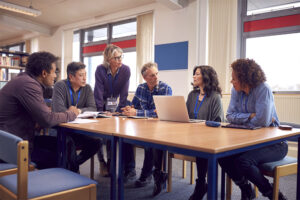Group smiling business people looking at camera. Meeting. Successful business, startup team
