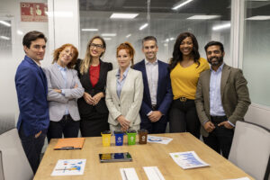 Group smiling business people looking at camera. Meeting. Successful business, startup team