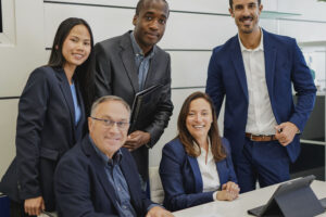 Group smiling business people looking at camera. Meeting. Successful business, startup team